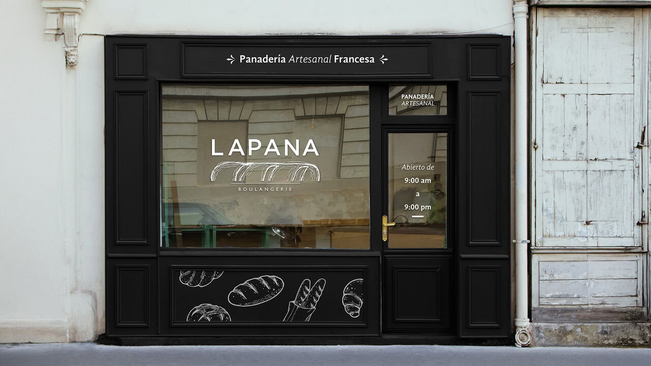 Nebly_LAPANA_Fachada_1920x1080 Fachada de la panadería LAPANA. Diseño en color negro con el logotipo en blanco y texto que indica 'Panadería Artesanal Francesa'. Diseño de exteriores para negocio.